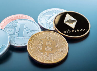 a few coins with crypto logos on them