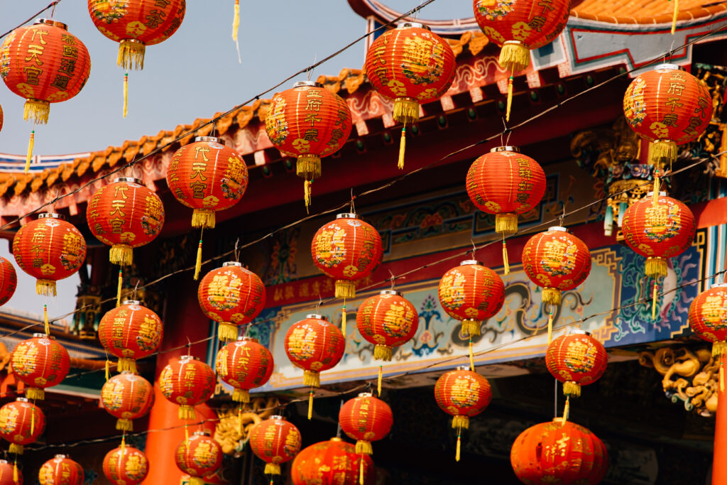 Chinese lanterns hanging in Chinese temple.