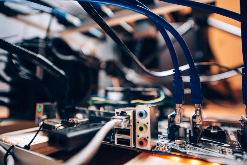 Close up of a mining rig with cables