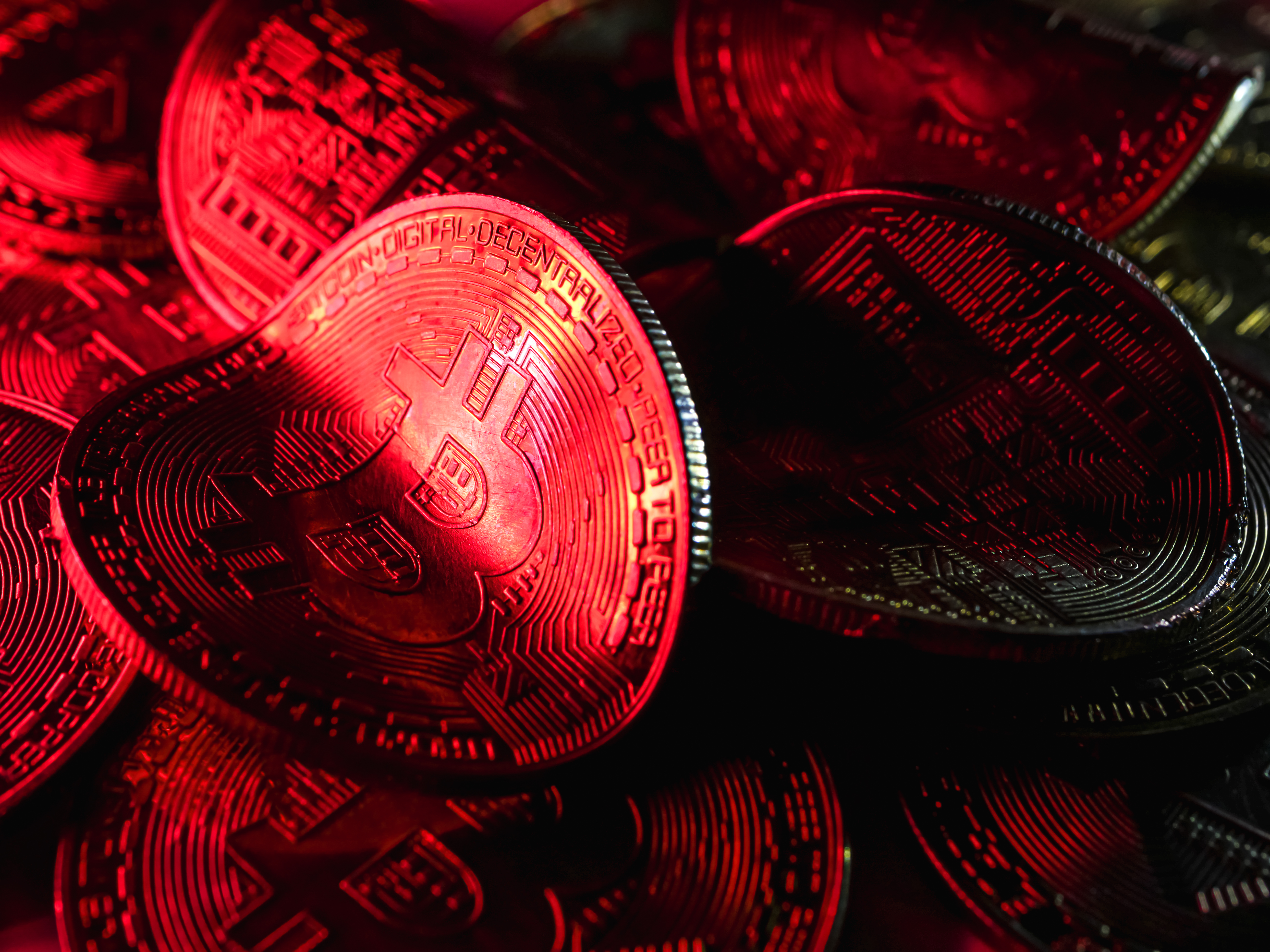 Twisted physical bitcoins under red light