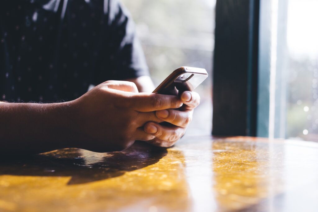 A man texting on his phone